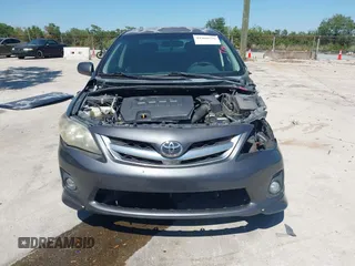 2011 Toyota Corolla L with VIN 2T1BU4EE8BC667772, listed as a IAAI auction lot 41960526 with 219,911 mi miles. Bid and sale history available at carsss.com. Image 13.