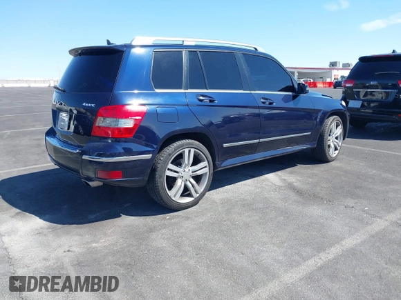 2012 Mercedes-Benz GLK 350 with VIN WDCGG8HB2CF805749, listed as a IAAI auction lot 42031442 with 152,313 mi miles and . Bid and sale history available at carsss.com. Image 4.