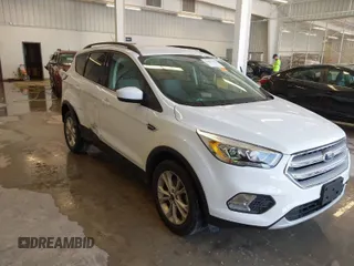 2017 Ford Escape SE z VIN 1FMCU0GD3HUC12658, wystawiony jako IAAI lot #41801033 z przebiegiem 107 662 mil mil oraz . Historia ofert i sprzedaży dostępna na DreamBid. Obrazek 1.