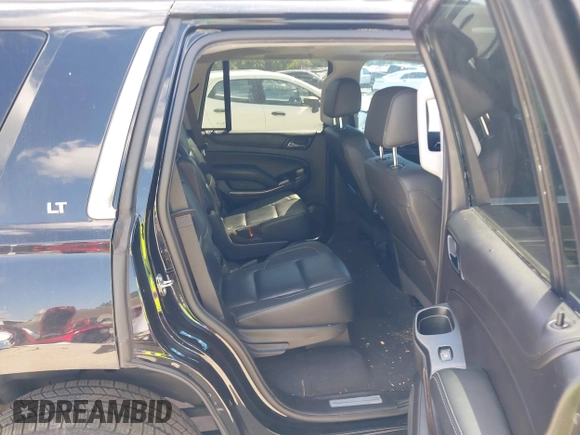 2019 Chevrolet Tahoe LT z VIN 1GNSKBKC1KR200476, wystawiony jako IAAI lot #41897702 z przebiegiem 136 432 mil mil oraz . Historia ofert i sprzedaży dostępna na DreamBid. Obrazek 8.