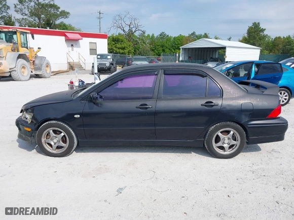 2002 Mitsubishi Lancer OZ-Rally with VIN JA3AJ86E22U074890, listed as a IAAI auction lot 42029591 with 235,818 mi miles. Bid and sale history available at carsss.com. Image 14.