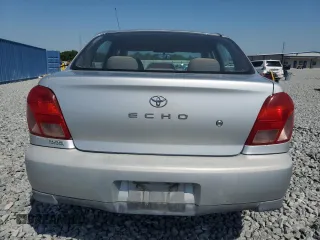 2002 Toyota ECHO with VIN JTDBT123720201801, listed as a Copart auction lot 53275455 with 261,832 mi miles and Salvage Title. Bid and sale history available at carsss.com. Image 6.