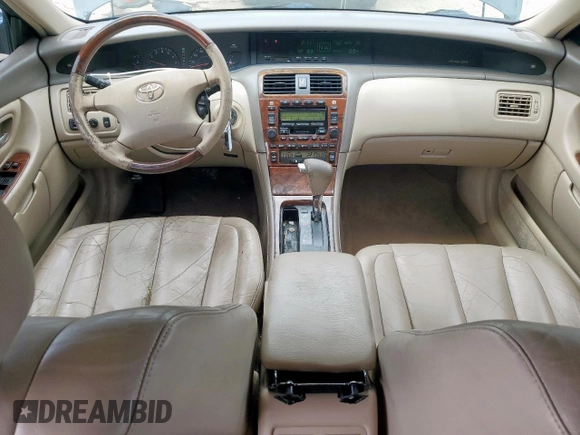 2003 Toyota Avalon XL z VIN 4T1BF28BX3U310285, wystawiony jako Copart lot #57664375 z przebiegiem 179 727 mil mil oraz Szkoda całkowita • Salvage title. Historia ofert i sprzedaży dostępna na DreamBid. Obrazek 8.