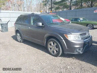 2016 Dodge Journey SXT with VIN 3C4PDDBG3GT118383, listed as a IAAI auction lot 41801212 with 136,068 mi miles. Bid and sale history available at carsss.com. Image 1.
