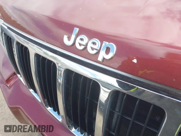 2007 Jeep Grand Cherokee Laredo with VIN 1J8GR48K27C518078, listed as a IAAI auction lot 42028460 with 121,530 mi miles. Bid and sale history available at carsss.com. Image 10.