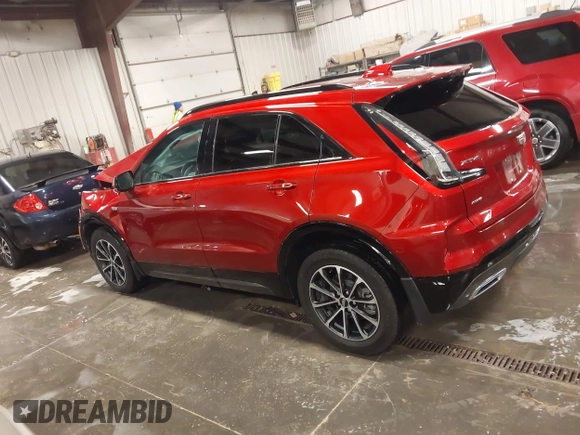 2024 Cadillac XT4 AWD Sport z VIN 1GYFZFR42RF154352, wystawiony jako IAAI lot #41249916 z przebiegiem 27 378 mil mil oraz . Historia ofert i sprzedaży dostępna na DreamBid. Obrazek 14.
