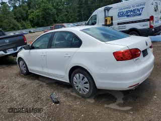 2014 Volkswagen Jetta S with VIN 3VW2K7AJ2EM240929, listed as a Copart auction lot 63842245 with 82,080 mi miles and Salvage title. Bid and sale history available at DreamBid. Image 2.