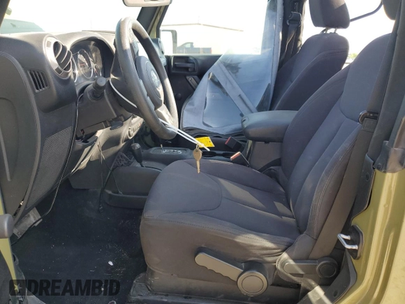 2013 Jeep Wrangler Sport with VIN 1C4AJWAG3DL649487, listed as a Copart auction lot 52568285 with 106,644 mi miles and Salvage title. Bid and sale history available at DreamBid. Image 7.