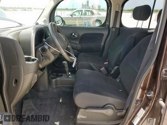 2012 Nissan Cube SL с VIN JN8AZ2KRXCT253710, выставлен на аукционе Copart как лот 61392915 с пробегом 164 438 миль миль и Списание • Salvage title. История ставок и продаж доступна на DreamBid. Изображение 7.