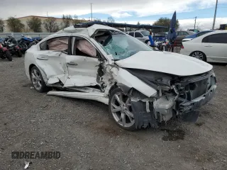 2014 Nissan Maxima SV with VIN 1N4AA5AP0EC471118, listed as a Copart auction lot 49008295 with 98,501 mi miles and Salvage title. Bid and sale history available at DreamBid. Image 4.