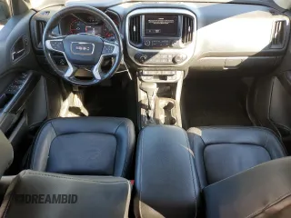 2016 GMC Canyon 4WD SLT with VIN 1GTP6DE11G1357147, listed as a Copart auction lot 77835344 with 106,890 mi miles and Salvage Title. Bid and sale history available at carsss.com. Image 8.