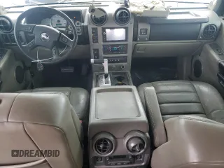 2004 Hummer H2 z VIN 5GRGN23U74H100175, wystawiony jako Copart lot #52642125 z przebiegiem 112 305 mil mil oraz Szkoda całkowita • Salvage title. Historia ofert i sprzedaży dostępna na DreamBid. Obrazek 8.