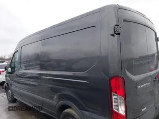2016 Ford Transit Cargo z VIN 1FTYR2CG8GKB14176, wystawiony jako IAAI lot #41563806 z przebiegiem 93 177 mil mil oraz . Historia ofert i sprzedaży dostępna na DreamBid. Obrazek 15.