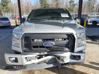 2015 Ford F-150 XLT with VIN 1FTEW1C86FKE85267, listed as a IAAI auction lot 41527996 with 119,800 mi miles and . Bid and sale history available at carsss.com. Image 12.