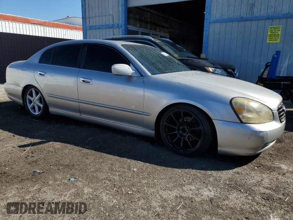 2003 Infiniti Q45 z VIN JNKBF01AX3M103002, wystawiony jako Copart lot #47860175 z przebiegiem 317 912 mil mil oraz Tytuł czysty. Historia ofert i sprzedaży dostępna na DreamBid. Obrazek 4.