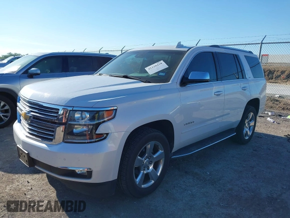 2016 Chevrolet Tahoe LTZ with VIN 1GNSKCKC0GR203348, listed as a IAAI auction lot 42220438 with 108,657 mi miles and . Bid and sale history available at DreamBid. Image 17.