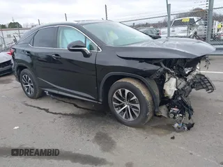 2020 Lexus RX with VIN 2T2HZMDA1LC256236, listed as a IAAI auction lot 41532918 with 64,673 mi miles. Bid and sale history available at carsss.com. Image 1.