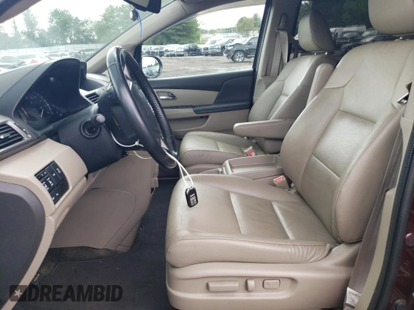 2015 Honda Odyssey Touring Elite with VIN 5FNRL5H98FB033336, listed as a Copart auction lot 57092355 with 186,046 mi miles and Salvage title. Bid and sale history available at DreamBid. Image 7.