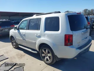 2012 Honda Pilot Touring with VIN 5FNYF3H91CB020673, listed as a IAAI auction lot 41721836 with 123,607 mi miles and . Bid and sale history available at carsss.com. Image 3.