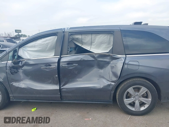 2019 Honda Odyssey EX-L z VIN 5FNRL6H79KB090711, wystawiony jako IAAI lot #41516059 z przebiegiem 126 871 mil mil oraz . Historia ofert i sprzedaży dostępna na DreamBid. Obrazek 13.