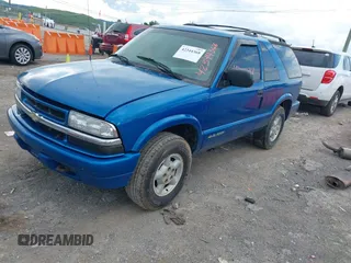 2000 Chevrolet Blazer LS z VIN 1GNCT18W6YK288858, wystawiony jako IAAI lot #42344368 z przebiegiem 207 183 mil mil oraz . Historia ofert i sprzedaży dostępna na DreamBid. Obrazek 2.
