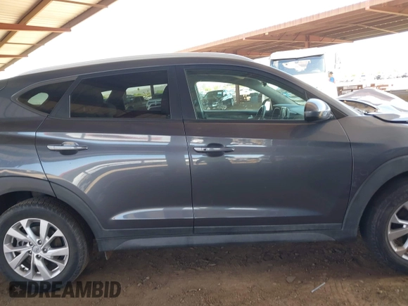 2021 Hyundai Tucson Value with VIN KM8J33A44MU403018, listed as a IAAI auction lot 42074597 with 63,654 mi miles and . Bid and sale history available at DreamBid. Image 14.
