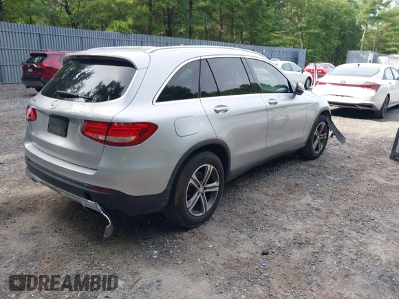 2016 Mercedes-Benz GLC with VIN WDC0G4JBXGF033897, listed as a IAAI auction lot 39965363 with 114,093 mi miles. Bid and sale history available at carsss.com. Image 4.