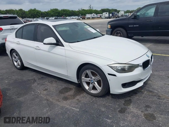 2013 BMW 3 Series 328i with VIN WBA3A5G51DNP26142, listed as a IAAI auction lot 41767977 with 129,440 mi miles. Bid and sale history available at carsss.com. Image 1.