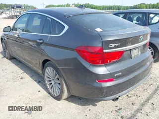 2013 BMW 5 Series GT 535i xDrive with VIN WBASP2C59DC339770, listed as a IAAI auction lot 42171135 with 106,625 mi miles. Bid and sale history available at carsss.com. Image 3.