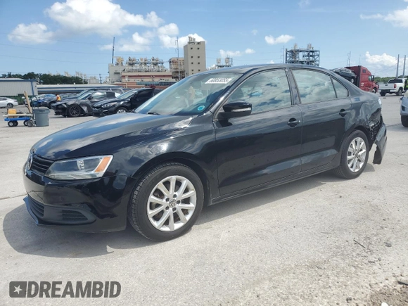 2012 Volkswagen Jetta SE with VIN 3VWDX7AJ3CM338441, listed as a Copart auction lot 60853055 with 151,075 mi miles and Salvage title. Bid and sale history available at DreamBid. Image 1.