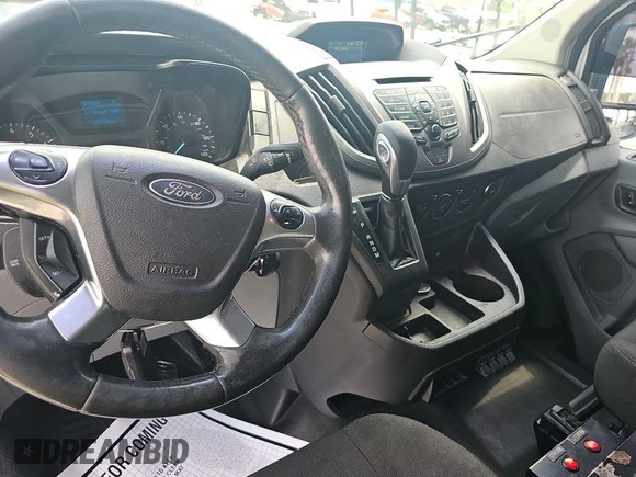 2015 Ford Transit Cargo with VIN 1FTNR1ZM3FKA45034, listed as a IAAI auction lot 42241072 with 100,506 mi miles and . Bid and sale history available at DreamBid. Image 1.