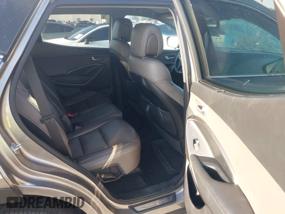 2017 Hyundai Santa Fe 2.4L z VIN 5XYZU3LB0HG420910, wystawiony jako IAAI lot #42017552 z przebiegiem 184 666 mil mil oraz . Historia ofert i sprzedaży dostępna na DreamBid. Obrazek 8.