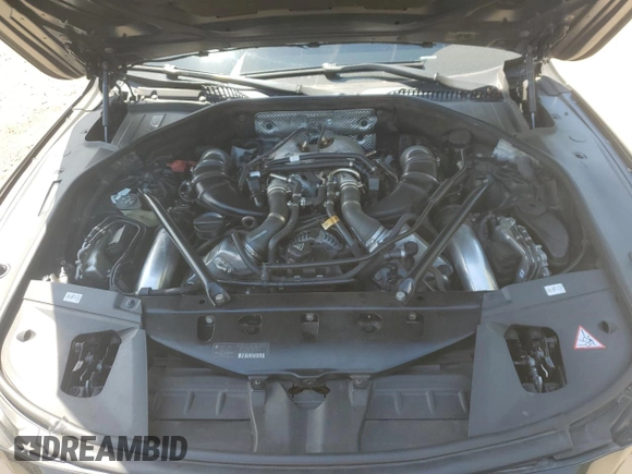 2014 BMW 7 Series 750i xDrive with VIN WBAYB6C52ED224536, listed as a Copart auction lot 54397595 with 107,410 mi miles and Salvage title. Bid and sale history available at DreamBid. Image 11.
