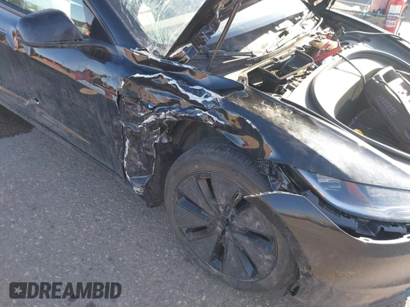 2025 Tesla Model 3 Long Range with VIN 5YJ3E1EB5SF877778, listed as a IAAI auction lot 41639595 with 8,295 mi miles and . Bid and sale history available at DreamBid. Image 6.