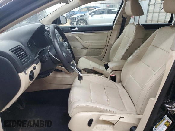 2010 Volkswagen Jetta Limited Edition with VIN 3VWAX7AJ4AM162032, listed as a Copart auction lot 56274115 with 164,642 mi miles and Salvage title. Bid and sale history available at DreamBid. Image 7.