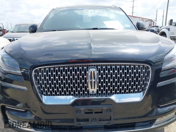 2020 Lincoln Aviator Reserve z VIN 5LM5J7XC9LGL24872, wystawiony jako IAAI lot #42112310 z przebiegiem 20 661 mil mil oraz . Historia ofert i sprzedaży dostępna na DreamBid. Obrazek 6.