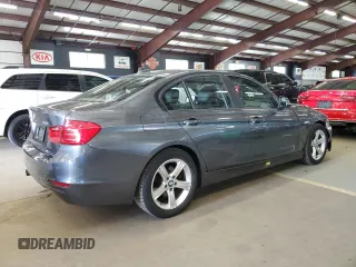 2014 BMW 3 Series 320i xDrive with VIN WBA3C3C53EF985375, listed as a Copart auction lot 62833435 with 75,726 mi miles and Salvage title. Bid and sale history available at DreamBid. Image 3.