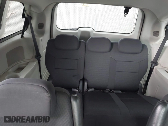 2010 Dodge Grand Caravan SXT with VIN 2D4RN5D17AR408112, listed as a IAAI auction lot 42128842 with 173,862 mi miles and . Bid and sale history available at DreamBid. Image 12.