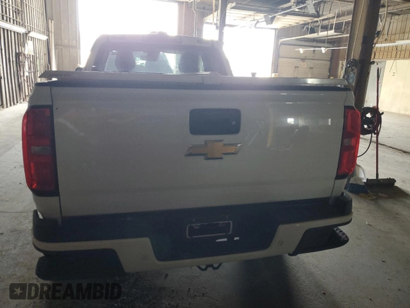 2020 Chevrolet Colorado 2WD LT z VIN 1GCHSCEA4L1183594, wystawiony jako Copart lot #63303835 z przebiegiem 58 912 mil mil oraz Czysty tytuł • Clean title. Historia ofert i sprzedaży dostępna na DreamBid. Obrazek 6.
