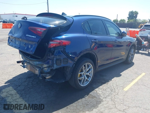 2019 Alfa Romeo Stelvio z VIN ZASPAKAN5K7C29955, wystawiony jako IAAI lot #42096049 z przebiegiem 85 935 mil mil oraz . Historia ofert i sprzedaży dostępna na DreamBid. Obrazek 4.