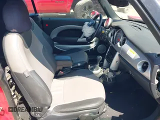 2006 MINI Convertible with VIN WMWRF33556TG14466, listed as a IAAI auction lot 42096368 with 120,230 mi miles and . Bid and sale history available at DreamBid. Image 5.