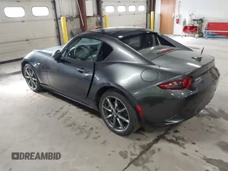 2021 Mazda MX-5 Miata Grand Touring with VIN JM1NDAM73M0451484, listed as a IAAI auction lot 41485044 with 11,328 mi miles and . Bid and sale history available at DreamBid. Image 3.
