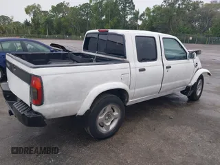 2000 Nissan Frontier XE z VIN 1N6ED27TXYC367744, wystawiony jako IAAI lot #42368078 z przebiegiem Nie podano mil oraz . Historia ofert i sprzedaży dostępna na DreamBid. Obrazek 4.