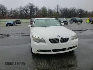 2006 BMW 5 Series 550i with VIN WBANB535X6CP01394, listed as a Copart auction lot 81225264 with 124,599 mi miles and Salvage Title. Bid and sale history available at DreamBid. Image 11.