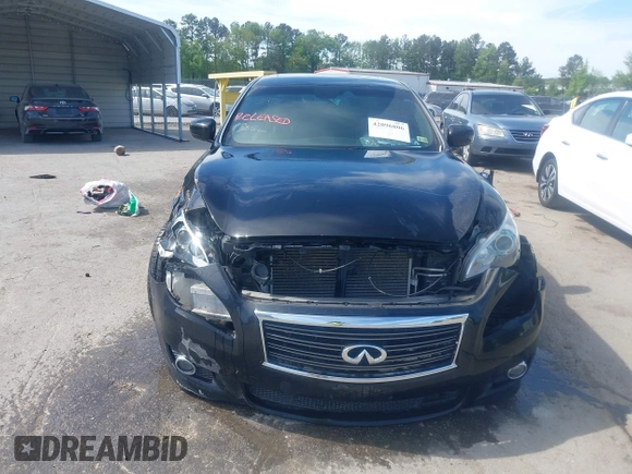 2013 Infiniti M with VIN JN1AY1AR6DM590187, listed as a IAAI auction lot 42096806 with 182,909 mi miles and . Bid and sale history available at DreamBid. Image 12.