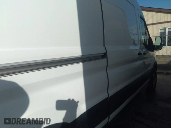 2019 Ford Transit with VIN 1FTYE2CM9KKB09353, listed as a IAAI auction lot 38121359 with 131,124 mi miles and . Bid and sale history available at DreamBid. Image 13.