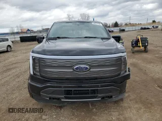 2022 Ford F-150 Lightning Pro z VIN 1FTVW1EL6NWG15167, wystawiony jako Copart lot #50514135 z przebiegiem 18 912 mil mil oraz Szkody całkowita. Historia ofert i sprzedaży dostępna na DreamBid. Obrazek 5.