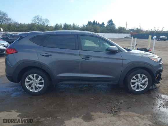 2019 Hyundai Tucson Value with VIN KM8J33A40KU999340, listed as a IAAI auction lot 41876380 with 52,752 mi miles. Bid and sale history available at carsss.com. Image 13.