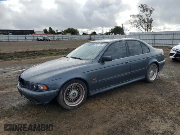 2000 BMW 5 Series 528iA with VIN WBADM6346YGU12169, listed as a Copart auction lot 82372384 with 152,818 mi miles and Salvage Title. Bid and sale history available at carsss.com. Image 1.