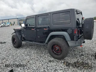 2018 Jeep Wrangler Unlimited Sport S with VIN 1C4BJWDG0JL818800, listed as a Copart auction lot 56648505 with 114,011 mi miles and Salvage Title. Bid and sale history available at DreamBid. Image 2.